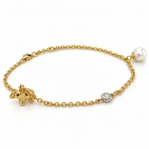 Armband "Bedels" Briljant 0,10crt IF D, Parel, Olifant.